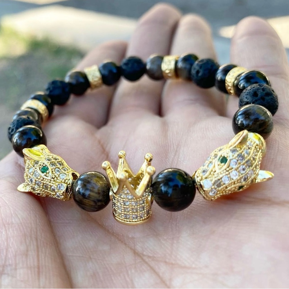 Gold and Black Beaded Bracelet with Crown and Leopard Accents